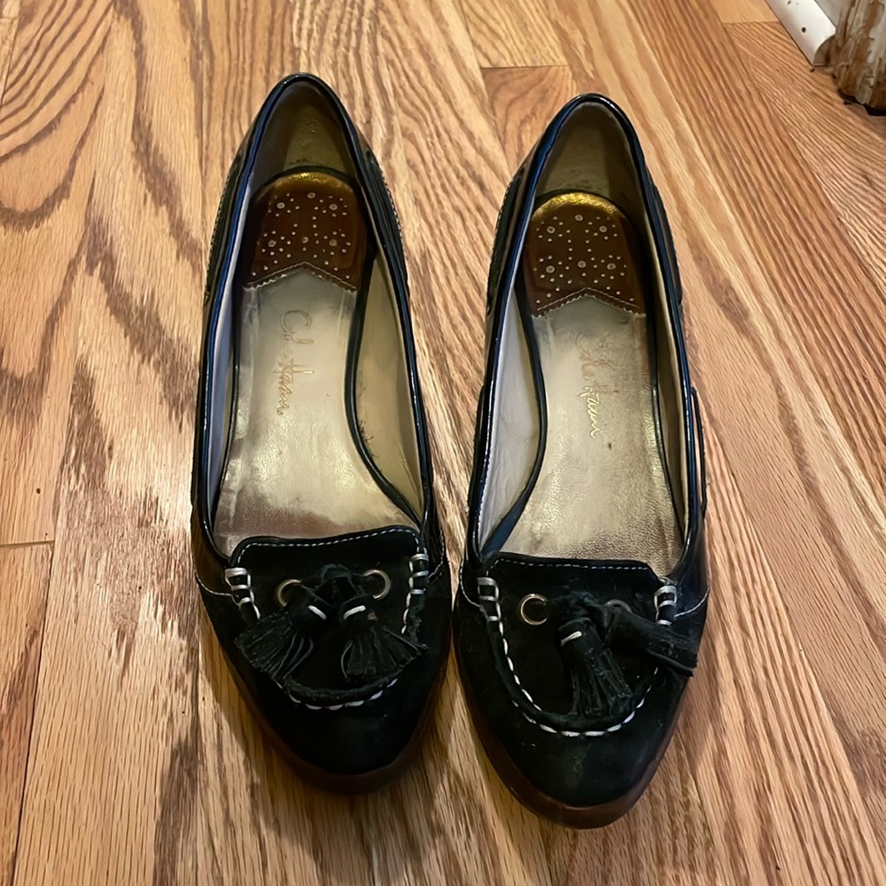 Cole Haan loafers with wedge heel.